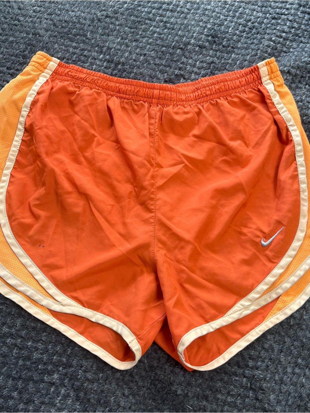 Orange Nike Women’s athletic shorts